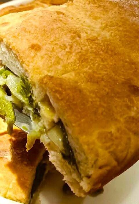 fetta di pizza rustica con scarola